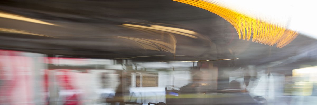 A bus travelling quickly